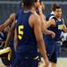 Michigan sophomore Trey Burke stretches with his teammates at Cowboys Stadium in Arlington, Texas on Thursday, March 28, 2013. Melanie Maxwell I AnnArbor.com